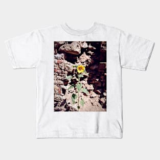 Sunflower in front of castle wall Kids T-Shirt